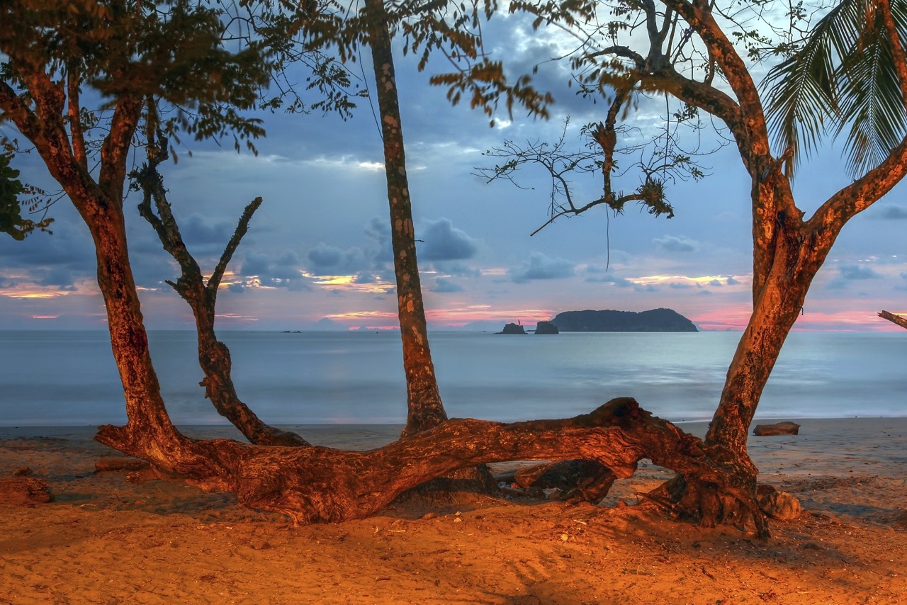 The Playa Espadilla Norte (beach), just outside the Manuel Antonio National Park in Costa Rica at sunset.