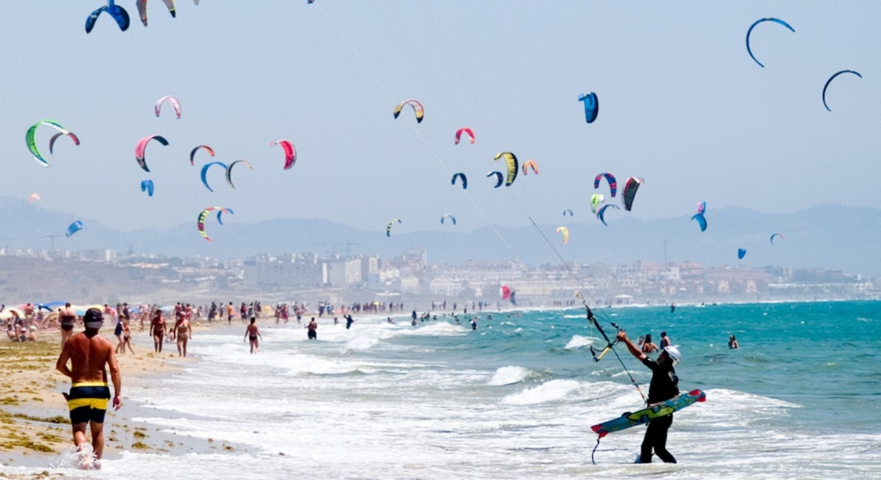 Thousands of surfers come to the beaches of Tarifa in southern Spain in the summer.