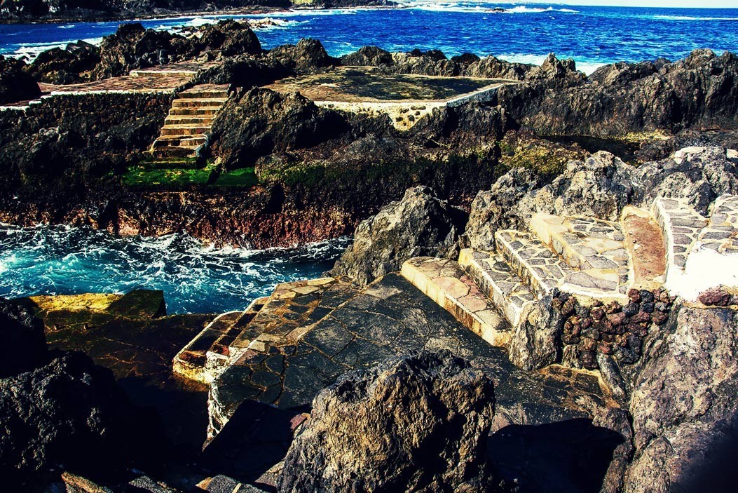 Spend time exploring the tide pools formed from lava on your next trip to the Canary Islands.
