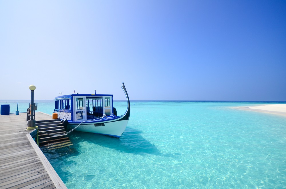 Malediven-Urlaub Tipps: Ausflug mit einem traditionellen Dhoni.