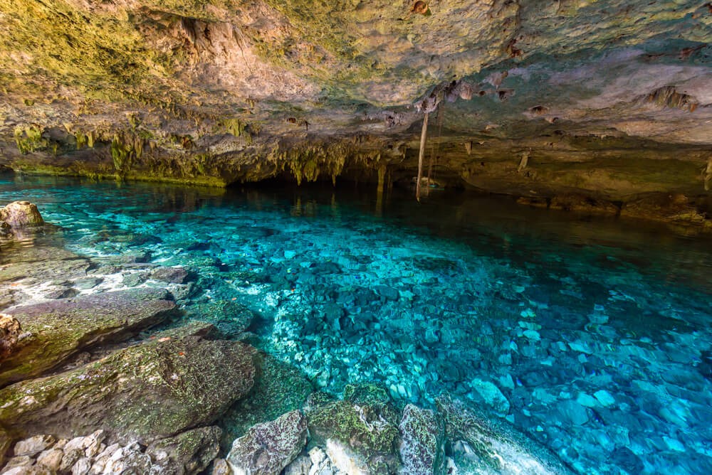 Take a swim in the Dos Ojos cenote, one of the favorite cenotes Mexico has near Tulum