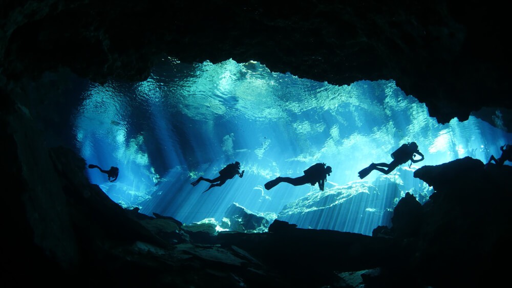 Scuba diving is one of the best ways to explore the cenotes Mexico is known for